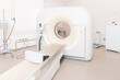 © mlphoto - Medical CT or MRI Scan in the modern hospital laboratory. Interior of radiography department. Technologically advanced equipment in white room. Magnetic resonance diagnostics machine