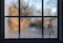 Close-up Of A Leaded Double Glazed Window With Condensation Inside On After A Very Cold Night