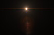 © aekachai - lens flare effect on black background