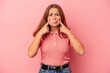 © Asier - Little caucasian girl isolated on pink background crying, unhappy with something, agony and confusion concept.