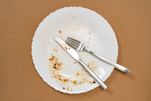 An Empty Plate, Dirty After The Meal Is Finished
