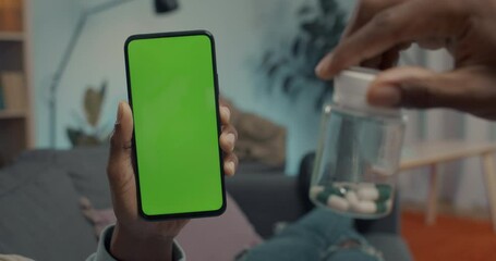 Sick man having video call on mobile with green screen