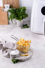 Wall Mural - French fries cooked in air fryer.