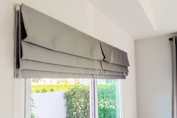 Roman blind curtain decoration in living room interior