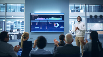 Poster - Presentation Event: On-Stage Black Businessman Speaker Presents Startup Big Data Statistics, Charts, Revenue Growth Infographics. Conference for Group of Diverse Investors, Businesspeople Applaud