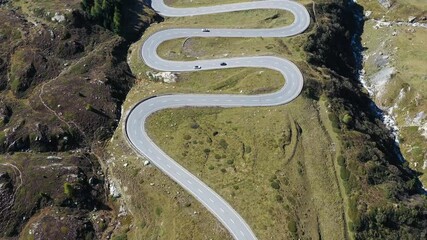 Wall Mural - julier pass, surses, switzerland. natural scenery in the highlands. a road with many curves among th