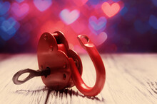 Open Red Heart-shaped Padlock Over Defocused Valentines Day Holiday Lights