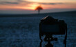 Taking pictures of the sunset with the camera in winter.