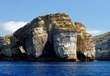 Scenic Cliffs Of Gozo Island In Malta In Bright Day