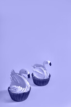 Two Flamingo Cupcakes Toned In Trendy Color Of Year 2022. Happy Birthday Card. Copy Space. Close-up.