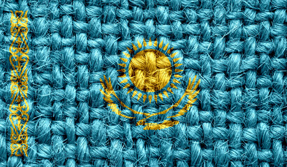 Kazakhstan flag on fabric texture. 3D image