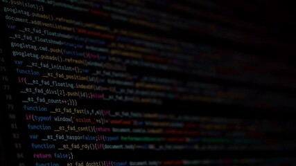 Wall Mural - code by young computer developer for data center management and cloud storage