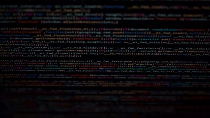Wall Mural - computer algorithm scrolling on a dark monitor showing coding lines