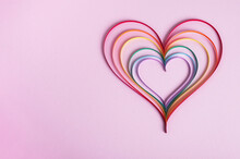 Heart In Colors Of Rainbow Stripes On Pastel Purple Background. Valentines Day, LGBT And Love Concept. Creative Minimal Composition. Top View, Flat Lay, Copy Space
