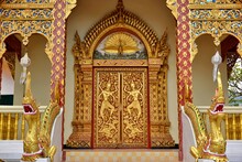 Thai Art Sculpture On The Enter Door Of Buddhist Sanctuary. Wat PraThat DoiSuthep Chiangmai Province, Thailand.
