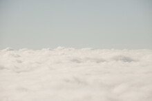 Scenery Seen From Airplane Above The White Clouds In The Sky