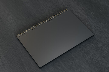 Wall Mural - Close up of blank black spiral notepad on dark wooden background. Mock up, 3D Rendering.