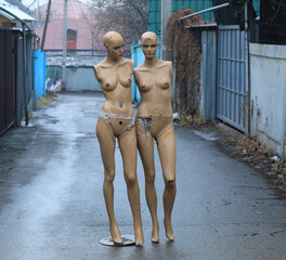 naked female mannequins on the street