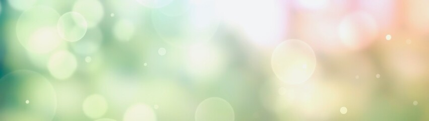 spring background - abstract banner - green blurred bokeh lights -
