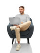 © Syda Productions - people and technology concept - happy smiling man with laptop computer sitting in chair over white background