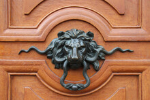 Wooden Door With A Knocker In Paris (france)
