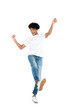 © LIGHTFIELD STUDIOS - full length view of african american man in jeans and t-shirt dancing on white.