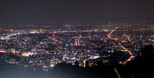 City Night Lights View From Mountain Of Chiang Mai Thailand With Skyline.