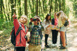 © standret - New places. Kids in green forest at summer daytime together