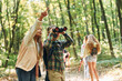 © standret - New places. Kids in green forest at summer daytime together