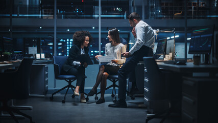 Poster - Diverse Team of Managers Working and Having Discussions in Big City Office in the Evening. Colleagues Talk, Discuss Business Opportunities, Evaluate Financial Reports, Plan Investment Strategy.