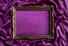 Moody Mockup Photography, Of An Old Sculpted Wooden Frame, On Purple Satin Background