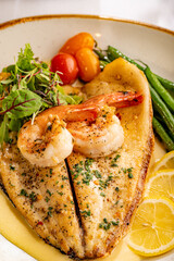 Wall Mural - Sauteed Pompano Filet topped with Gulf Shrimp, Tomatoes and Haricots Verts