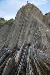 Wall Mural - itzurun beach in zumaia with the famous flysch coast in the basque country