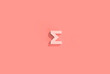 The Summation Symbol Sigma on Coral Pink Background.