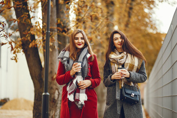 Elegant women in a autumn city