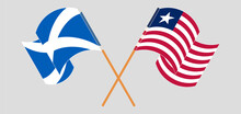 Crossed And Waving Flags Of Scotland And Liberia