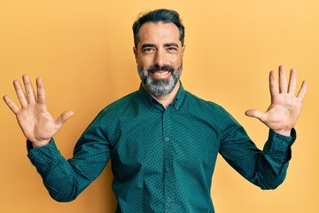 Sticker - Middle age man with beard and grey hair wearing business clothes showing and pointing up with fingers number ten while smiling confident and happy.