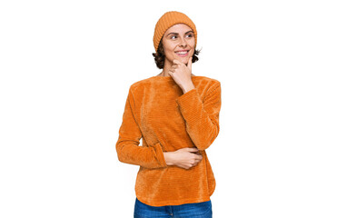 Canvas Print - Young hispanic woman wearing casual clothes and wool cap with hand on chin thinking about question, pensive expression. smiling with thoughtful face. doubt concept.