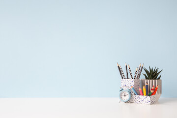 Canvas Print - Learning desk full of school accessories and plant. Empty desk. Creative workspace. Banner. Mock up.	