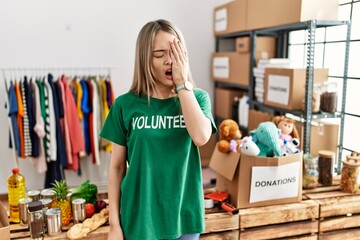 Sticker - Asian young woman wearing volunteer t shirt at donations stand yawning tired covering half face, eye and mouth with hand. face hurts in pain.