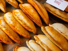Closeup Of Baked Snack Empanada At Market, Popular Spanish Street Food