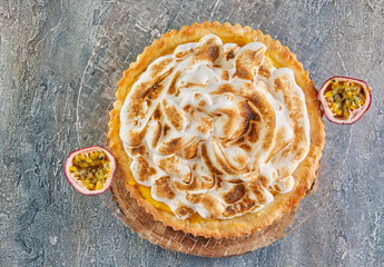 Poster - Passion flower pie on plate with pasiflora halves. French gourmet cuisine