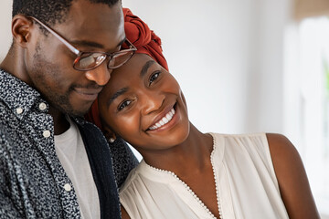 Wall Mural - Loving mature man embracing his wife and smiling