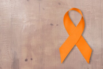 Poster - An orange tape over the background. campaign to prevent skin cancer, melanoma,