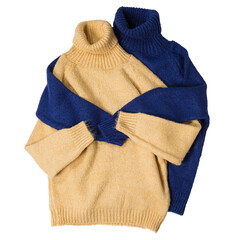 Two woolen sweaters, yellow and blue, side by side, as if hugging and taking care, concept, on white background