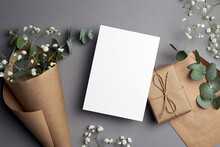 Greeting Card Mockup With Gift Box And Natural Eucalyptus And Gypsophila Flowers