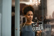 © ReeldealHD images - Portrait of store owner closing store