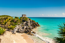Ruins Of The Ancient Mayan City Of Tulum In Mexico Taken On Warm Summers Day With Clear Blue Skies And Turquoise Caribbean Seas. Tulum Was One Of The Last Cities Inhabited By The Mayas.