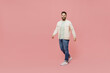© ViDi Studio - Full body young cheerful smiling friendly happy caucasian man 20s wearing trendy jacket shirt walking go stroll isolated on plain pastel light pink background studio portrait People lifestyle concept