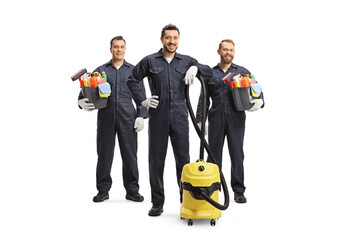 Wall Mural - Professional cleaners in uniforms with a vacuum cleaner and cleaning supplies